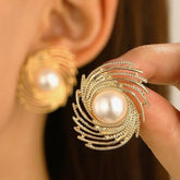 Pearl spiral earrings.